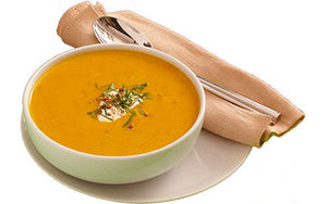 Carrot and coriander soup served in a bowl