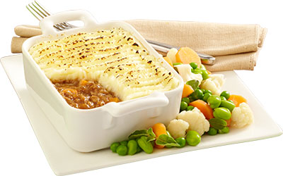 Cottage pie served with steamed vegetables