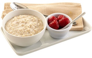 Gluten free oats served with raspberries