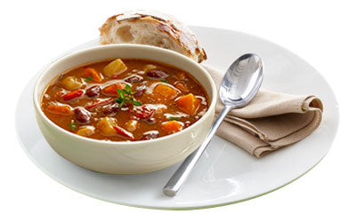 Smoked bacon and three bean soup served with bread