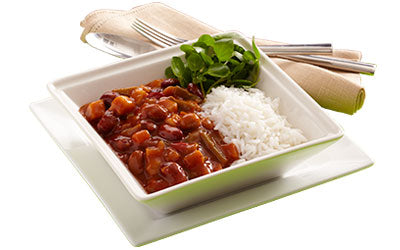 Vegetable chilli served with rice and green salad